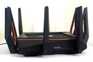 Front shot of ASUS ROG Rapture GT-AX11000 router with antennas up